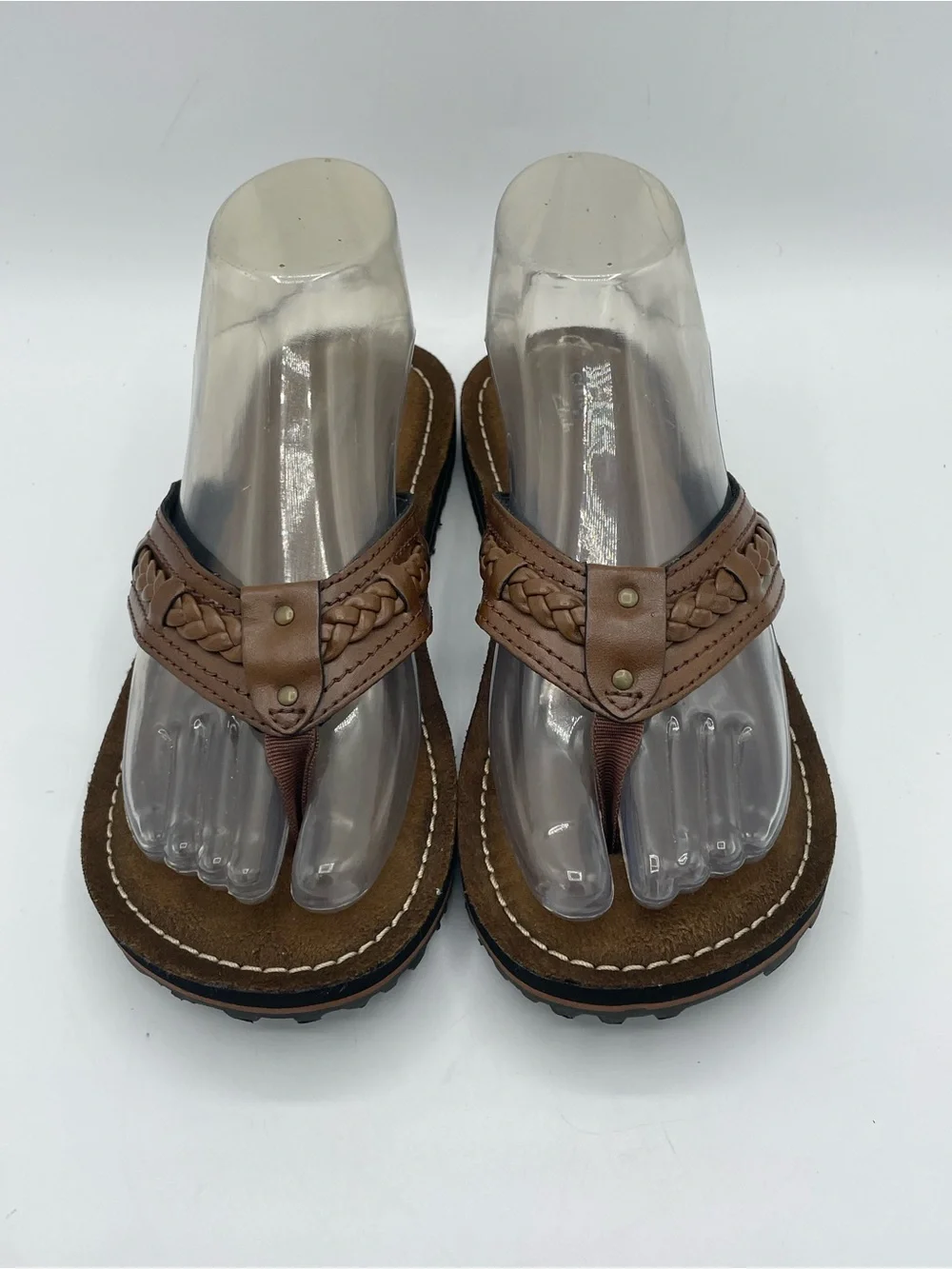 Clarks Collection Women’s Brown Braided Leather Toe-Post Sandals.